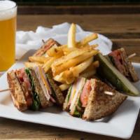 Smoked Clubhouse Sandwich · Ham, turkey, cheddar & provolone cheese, smoked in-house and stacked with bacon, lettuce, to...