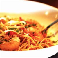 Spicy Shrimp Pasta · Sauteed Shrimp tossed with garlic, crushed red and black pepper seasoning, with butter and o...