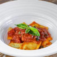 Ravioli · Stuffed with ricotta cheese and spinach, in San Marzano tomato sauce, with fresh basil and P...