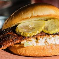 Seared Cajun Mahi Sandwich · Seared Cajun Mahi w/ Slaw & Pickle on a Potato Bun