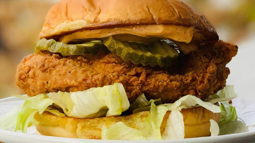 Chicken Sandwich · House Brined, Hand Breaded, & Fried Crispy w/ Lettuce, Pickle, & Spicy Mayo on a Potato Roll
