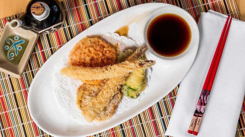 Tempura Appetizer · Two pieces crispy shrimp and three pieces assorted vegetables with tempura sauce.
