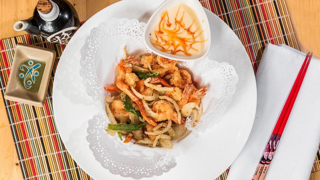 Salt & Pepper Shrimp · Crispy jumbo shrimp with onion, scallions, red pepper, carrots with sweet, and savory dipping sauce.