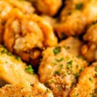 10 Chicken Wings · Crispy and juicy chicken wings with your choice of sauce!