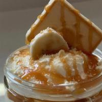 Caramel Banana Pudding · Our Signature Banana Pudding drizzled with Caramel. Contains Dairy*