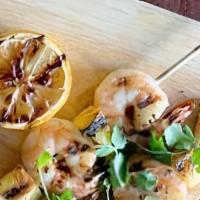 Shrimp Skewers · Grilled shrimp and pineapple skewers with sweet pineapple chili sauce.