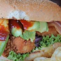 Cluck & Squeal · Grilled or fried all natural chicken breast, bacon, avocado, lettuce, tomato, red onion, swe...