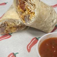 Breakfast Burrito · Eggs, sausage, cheese, sour cream, salsa all wrapped inside a 12