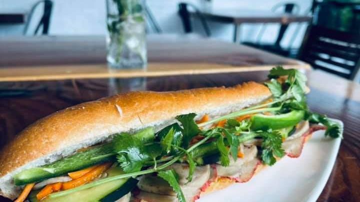 Banh Mi · Toasted baguette with butter spread along with choice of protein, cucumber, cilantro, jalapeños, pickled carrots, pickled radish and house BBQ sauce inside.