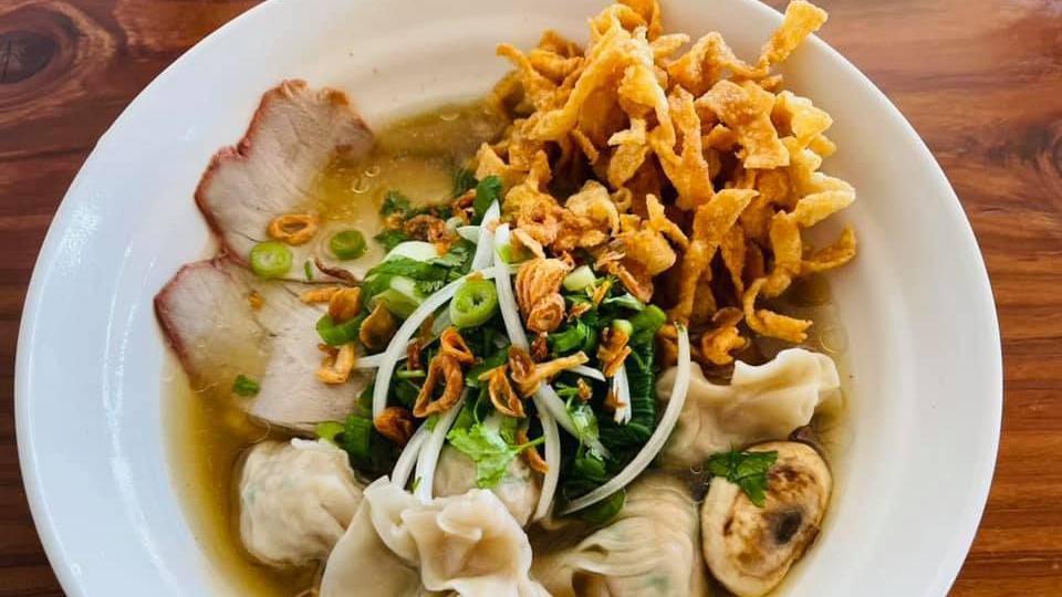 Wonton Noodles Soup · Served flat egg noodles in richly Vietnamese style chicken broth, comes with savory wonton filled with ground pork and shrimp.