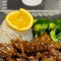 Orange Chicken · Fried and crispy pieces of chicken covered in authentic tangy orange sauce that is sweet and...