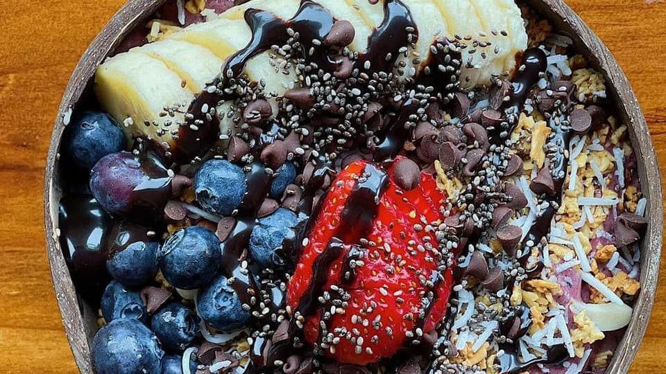 Chocolava Bowl · Base: Acai, Blueberry, Banana, and Coconut Water
Toppings: Granola, Banana, Strawberry, Chocolate Chips, Peanut Butter, Chia Seeds, Shredded Coconut, and Chocolate Drizzle