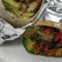 Philly Steak Burrito  · Grilled peppers and onions, thinly sliced steak, black beans, rice and sour cream