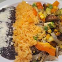 Vegetable Fajitas  · Roasted corn, spinach mushrooms peppers, sauteed onions, rice and beans comes with 5 tortillas