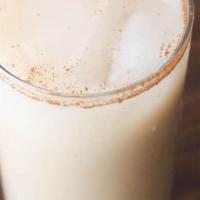 Agua De Horchata · Cinnamon and rice drink  (contains dairy)