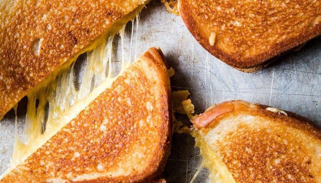 Grilled Cheese  · white bread toasted with herbs and garlic