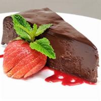 Chocolate Sin Cake · Rich flourless cake, ganache, raspberry sauce.