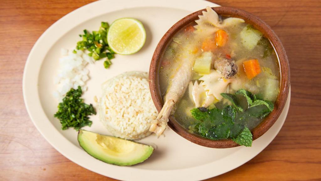 Sopa De Gallina · All served with rice and tortillas. todos los platos incluyen tortillas y arroz.