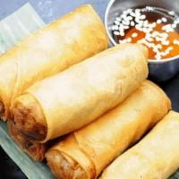 Crispy Spring Rolls · Crispy rolls stuffed with vegetables rolls. Served with homemade sweet and sour sauce.