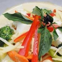 Green Curry · Soft/fried tofu with seasonal vegetables, bamboo shoots, bell peppers. Cooked with green cur...