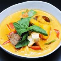 S-6. Pumpkin Curry · Soft&fried tofu, plant-based meat, steamed pumpkin, bell peppers. Cooked in red curry, toppe...
