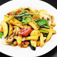 Cashew Delight · Fried tofu, cashews, shiitake mushrooms, onions, bell peppers, carrots, zucchini, baby corns...