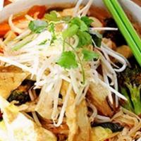Araya'S Noodle Soup · Wide/thin rice noodles cooked in lime dressing and tom yum paste, clear broth, fried tofu an...