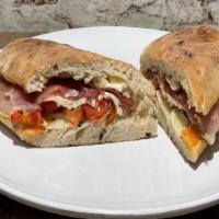 Pmt · Prosciutto di Parma, fresh mozzarella, basil, cherry tomatoes.over baked sandwiches.