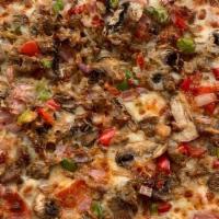 The Southsider · Pepperoni, Ham, Sausage, Red Onion, Mushrooms, Bell Peppers, Mozzarella, Romano, and Parmesan.