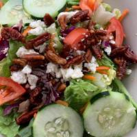 Feta And Pecan House · Romaine Lettuce, Carrots, Red Cabbage, Cucumbers, Tomatoes, Feta Cheese, & Honey Roasted Pec...