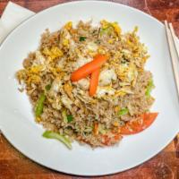 Thai Fried Rice · Stir-fried jasmine rice with onion, tomatoes and egg,
