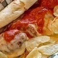 Jumbo Meatball Sub · Mighty homemade meatballs covered with melted Mozzarella server on our 8