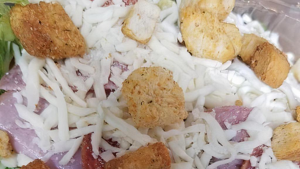 Big Chef Salad · Salad mix topped with cucumbers, tomatoes, pepperoni, salami, ham, croutons, and Mozzarella cheese. with your choice of dressing on the side.