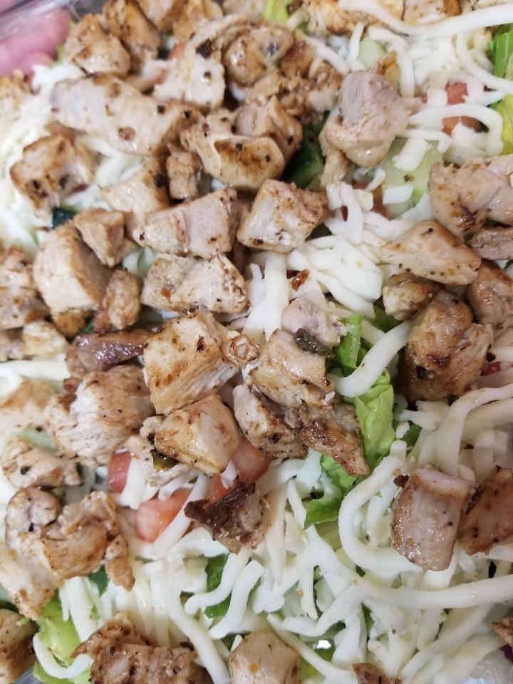 Big Grilled Chicken Salad · Salad mix topped with grilled chicken, cucumbers, tomatoes, croutons and Mozzarella cheese. your choice of dressings on the side.