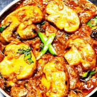 Roasted Mushroom Curry (Kaalan Varutha Curry ) · Vegan. Mushroom sautéed with onions, black pepper, and cooked with chettinad spices