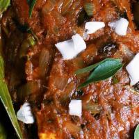 Paneer Pollichathu (Cottage Cheese Masala Fry) · Cottage Cheese wrapped with onion, tomatoes and spices inside banana leaf and cooked on gril...