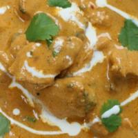 Korma · Meat / Paneer  braised with with cream and spices to produce a thick sauce