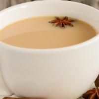 Masala Tea · Indian style chai tea with milk flavored with spices