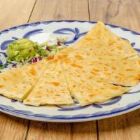 Quesadilla - Cheese · Grilled with a hint of garlic until crisp and golden brown with pico de gallo, salsa picante...
