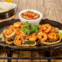 Shrimp Fajitas · Tender shrimp sautéed in jalapeño-garlic butter and guajillo chile sauce. Served with rice, ...