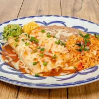 Enchilada Rancheras - Beef · Melted jack cheese and beef barbacoa with ranchera sauce served with guacamole, refried bean...
