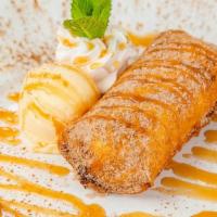 Cheesecake Banana Chimi · Creamy cheesecake and plantain bananas wrapped in a tortilla and fried to crispy perfection ...