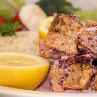 Shish Tawook · 1 skewer of marinated and charbroiled chicken breast kabob.