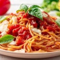 Spaghetti · Classic homestyle spaghetti made with mushrooms, chicken or meatballs. Served with garlic br...