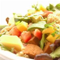 Bosch Salad · Spring mix with quinoa, veggie salami, green onion, tomato, avocado, mango, cilantro dressed...