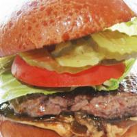 The Frjtz Burger · A juicy 6oz burger served on a perfect brioche bun with caramelized onions, chipotle remoula...