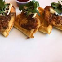 Fried Chicken & Waffle · Buttermilk chicken with our 10 spice recipe fried to perfection and served on a brussels waf...