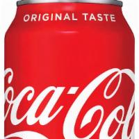 Coke · With cane sugar