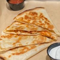 Chicken Quesadilla
 · Chicken and melted mozzarella in a crispy tortilla. Served with salsa and sour cream.