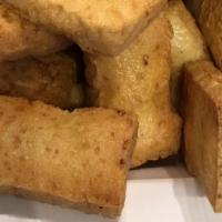 Fried Tofu · 8. Gluten free. Vegetarian. Golden fried tofu served with sweet and sour sauce and golden pe...
